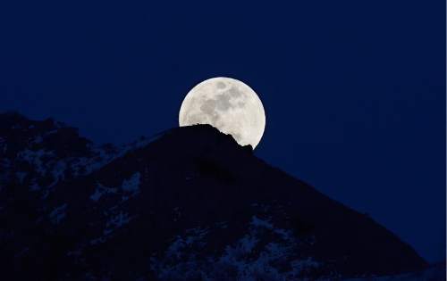 Scott Sommerdorf   |  The Salt Lake Tribune
A full moon rises over the Wasatch range as seen from Millcreek, Sunday, Feb. 21, 2016. A Utah-based online campaign called "Name the Moon" is gathering signatures to petition the International Astronomical Union to give the moon a unique name.