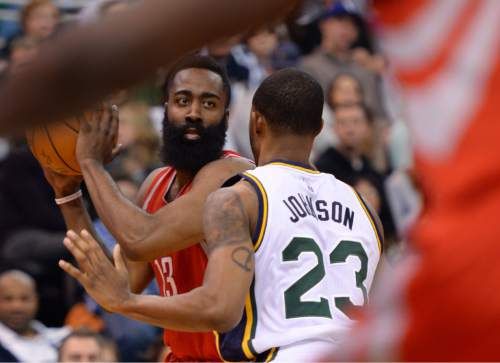 Steve Griffin  |  The Salt Lake Tribune


Houston Rockets guard James Harden (13) is guarded by Utah Jazz forward Chris Johnson (23) during the Utah Jazz versus Houston Rockets game at Vivint Smart Home Arena in Salt Lake City, Tuesday, February 23, 2016.