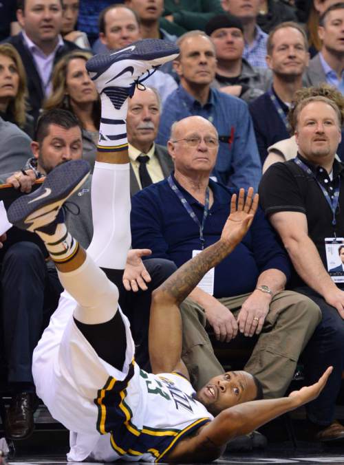 Steve Griffin  |  The Salt Lake Tribune


Utah Jazz forward Chris Johnson (23) crashes to the floor after saving the ball from going out of bounds during the Utah Jazz versus Houston Rockets game at Vivint Smart Home Arena in Salt Lake City, Tuesday, February 23, 2016.