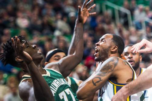 Chris Detrick  |  The Salt Lake Tribune
Utah Jazz forward Chris Johnson (23) shoots past Milwaukee Bucks forward Johnny O'Bryant III (77) during the game at Vivint Smart Home Arena Friday February 5, 2016.