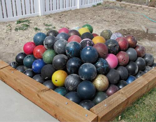 Robert Kirby  |  The Salt Lake Tribune

"Sonny's" 152 bowling balls being cared for by Robert Kirby.