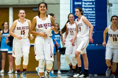 Chris Detrick  |  The Salt Lake Tribune
Bountiful's Amy Chidester (3) and her teammates celebrate during the 4A girls' basketball semifinals at Salt Lake Community College Friday February 26, 2016. Bountiful won the game 59-51.