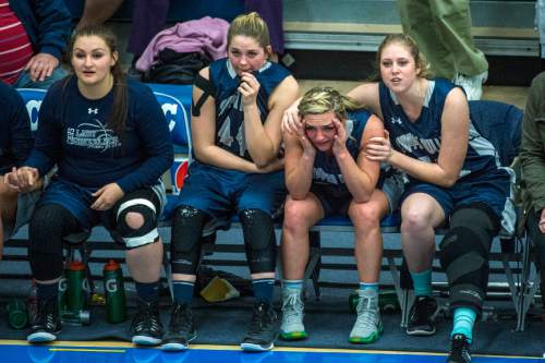 Chris Detrick  |  The Salt Lake Tribune
Members of the Copper Hills basketball team watch during the 5A girls' basketball semifinals at Salt Lake Community College Friday February 26, 2016. Layton defeated Copper Hills 46-44 in overtime.