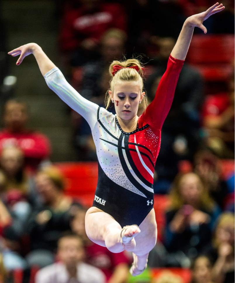 Chris Detrick  |  The Salt Lake Tribune
Utah's MaKenna Merrell competes on the beam during the gymnastics meet against BYU at the Huntsman Center Friday January 8, 2016.