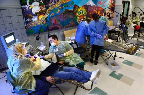 Scott Sommerdorf   |  The Salt Lake Tribune       
Dental students work on some of the approximately 200 patients served at the semi-annual free dental fair at Horizonte organized by the Junior League of Salt Lake City, Saturday, February 27, 2016.
