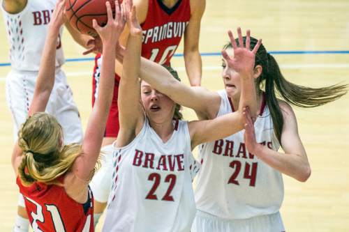 Chris Detrick  |  The Salt Lake Tribune
Springville's Cheyanne Brown (21) Bountiful's Mary Larson (22) and Bountiful's Kennedy Redding (24) go for a rebound during the 4A girls' basketball championships at Salt Lake Community College Saturday February 27, 2016.