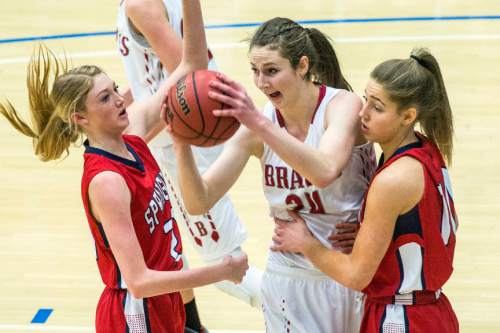 Chris Detrick  |  The Salt Lake Tribune
Springville's Cheyanne Brown (21) Bountiful's Kennedy Redding (24) and Springville's Savannah Sumsion (10) go for a rebound during the 4A girls' basketball championships at Salt Lake Community College Saturday February 27, 2016.