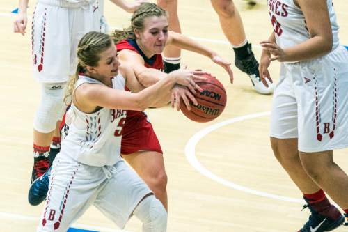 Chris Detrick  |  The Salt Lake Tribune
Bountiful's Kassidy Larsen (5) and Springville's Ali Monson (11) go for the ball during the 4A girls' basketball championships at Salt Lake Community College Saturday February 27, 2016.