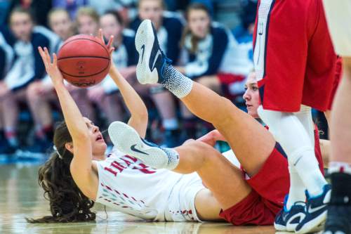 Chris Detrick  |  The Salt Lake Tribune
Springville's Ali Monson (11) and Bountiful's Kieran Gillins (10) go for the ball during the 4A girls' basketball championships at Salt Lake Community College Saturday February 27, 2016.