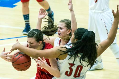 Chris Detrick  |  The Salt Lake Tribune
Springville's Lydia Austin (2) charges Bountiful's Lovely Tukuafu (30) during the 4A girls' basketball championships at Salt Lake Community College Saturday February 27, 2016.