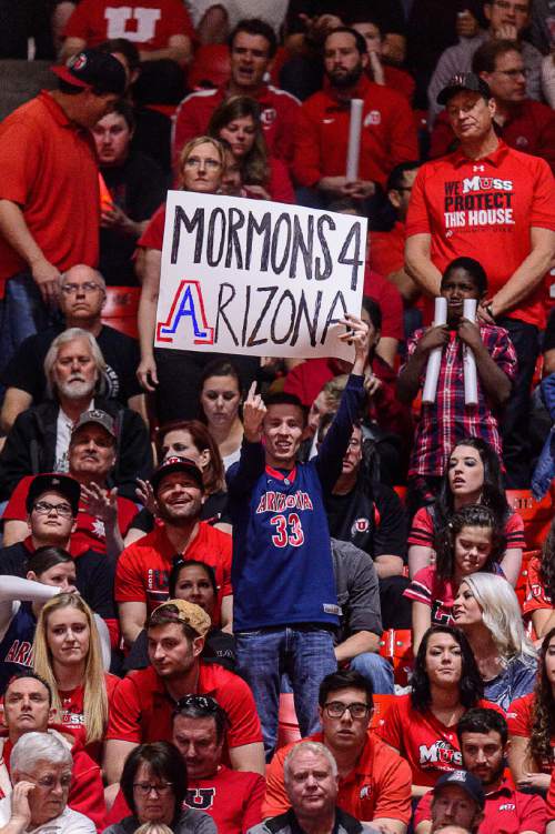 Trent Nelson  |  The Salt Lake Tribune
A fan holds a sign reading, "Mormons 4 Arizona" as Utah hosts Arizona, NCAA basketball at the Huntsman Center in Salt Lake City, Saturday February 27, 2016.