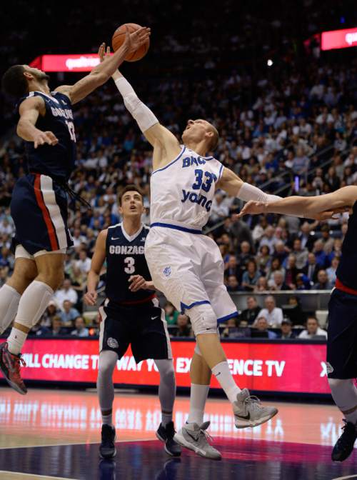 Francisco Kjolseth | The Salt Lake Tribune
Brigham Young Cougars forward Nate Austin (33) reaches out for a ball against Gonzaga in game action at the Marriott Center, Provo, UT.