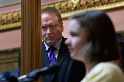 Scott Sommerdorf   |  Tribune file photo
Sen, Mark Madsen, R-Saratoga Springs, reacts with some emotion as he listens to sixteen year old Maddie Campbell speak about how she was helped by medical marijuana. The Campbell family has had to make tough choices given Utah's current law and the position of the LDS Church. 
 "Every day we commit a felony to save our daughter's life," says Maddie's father Aaron.