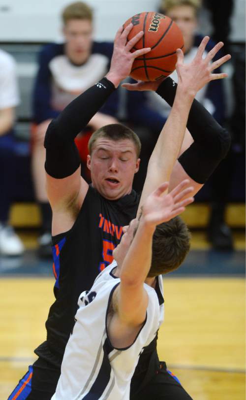Steve Griffin  |  The Salt Lake Tribune


Timpview's AJ Bollinger rips a rebound away from Corner Canyon's Brayden Johnson as second-ranked Corner Canyon hosted No. 1 Timpview in a Region 7 boys' basketball game in Draper, Utah Tuesday, February 16, 2016.