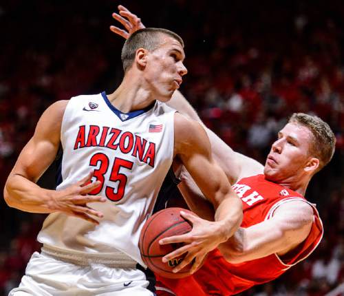 Trent Nelson  |  The Salt Lake Tribune
Arizona Wildcats center Kaleb Tarczewski (35) runs into Utah Utes forward Jakob Poeltl (42) as Utah hosts Arizona, NCAA basketball at the Huntsman Center in Salt Lake City, Saturday February 27, 2016.