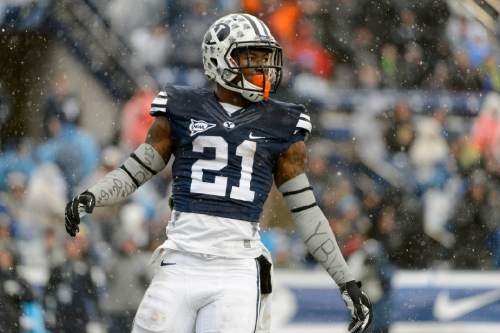 Trent Nelson  |  The Salt Lake Tribune
Brigham Young Cougars running back Jamaal Williams (21) celebrates a tochdown as BYU hosts Idaho State, college football at LaVell Edwards Stadium in Provo, Saturday November 16, 2013.