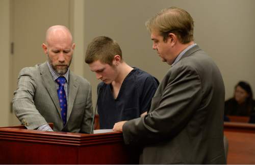 Francisco Kjolseth | The Salt Lake Tribune
Darwin Christopher Bagshaw, 18, center appears at the Matheson courthouse in Salt Lake City for a change of plea hearing on Monday, Feb. 29, 2016, alongside attorney's Adam Crayk, left, and Chris Bown. Bagshaw is charged with one count of first-degree felony murder for the 2012 death of Anne Kasprzak. Bagshaw, who was 14 at the time of the homicide, pleaded not guilty to the crime last year and a three-week trial had been set to begin March 7, nearly four years to the day after Kasprzak was beaten to death and her body dropped in the Jordan River.