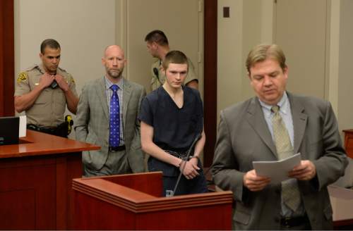 Francisco Kjolseth | The Salt Lake Tribune
Darwin Christopher Bagshaw, 18, center appears at the Matheson courthouse in Salt Lake City for a change of plea hearing on Monday, Feb. 29, 2016, alongside attorney's Adam Crayk, left, and Chris Bown. Bagshaw is charged with one count of first-degree felony murder for the 2012 death of Anne Kasprzak. Bagshaw, who was 14 at the time of the homicide, pleaded not guilty to the crime last year and a three-week trial had been set to begin March 7, nearly four years to the day after Kasprzak was beaten to death and her body dropped in the Jordan River.