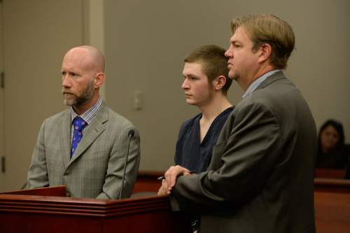 Francisco Kjolseth | The Salt Lake Tribune
Darwin Christopher Bagshaw, 18, center appears at the Matheson courthouse in Salt Lake City for a change of plea hearing on Monday, Feb. 29, 2016, alongside attorney's Adam Crayk, left, and Chris Bown. Bagshaw is charged with one count of first-degree felony murder for the 2012 death of Anne Kasprzak. Bagshaw, who was 14 at the time of the homicide, pleaded not guilty to the crime last year and a three-week trial had been set to begin March 7, nearly four years to the day after Kasprzak was beaten to death and her body dropped in the Jordan River.