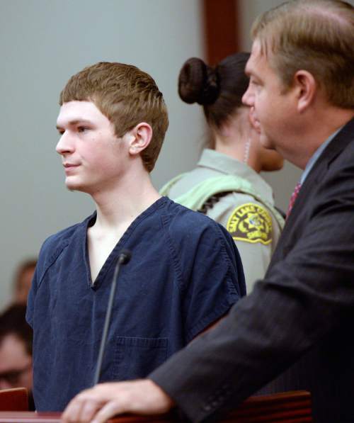 Al Hartmann  |  The Salt Lake Tribune
Darwin Christopher Bagshaw, now 18, attends a disposition hearing before 3rd District Judge James Blanch in Salt Lake City Friday July 31 with his defense lawyer Christopher Bown.   A jury trial date was set for the end of the year. 
The teen is accused of killing his 15-year-old girlfriend, Anne Kasprzak, in March 2012, when he was 14.
Bagshaw was originally charged as a juvenile, but a juvenile court judge in April transferred it to adult court.