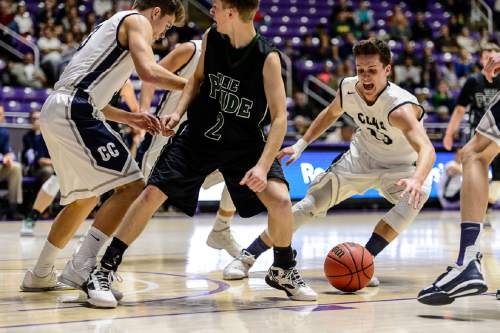 Trent Nelson  |  The Salt Lake Tribune
Corner Canyon's Brayden Johnson (13) picks up a loose ball as Payson faces Corner Canyon in a first round game at the 4A state high school basketball tournament at the Dee Events Center in Ogden, Monday February 29, 2016.