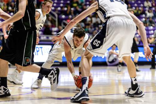 Trent Nelson  |  The Salt Lake Tribune
Corner Canyon's Brayden Johnson (13) picks up a loose ball as Payson faces Corner Canyon in a first round game at the 4A state high school basketball tournament at the Dee Events Center in Ogden, Monday February 29, 2016.