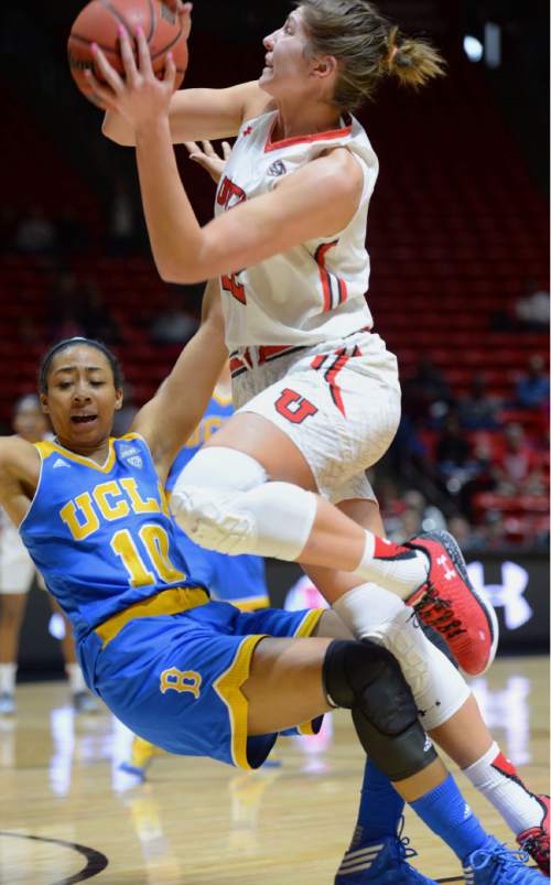 Steve Griffin  |  The Salt Lake Tribune


Utah Utes forward Emily Potter (12) crashes into UCLA's Kacy Swain drawing a charging foul during basketball game at the Huntsman Center in Salt Lake City, Sunday, January 31, 2016.