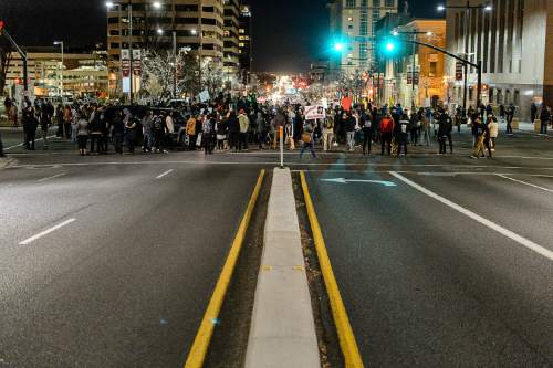 Trent Nelson  |  The Salt Lake Tribune
Protesters occupy the intersection of 100 South State Street to protest the police shooting of 17-year-old Abdi Mohamed on Saturday night, Monday February 29, 2016.
