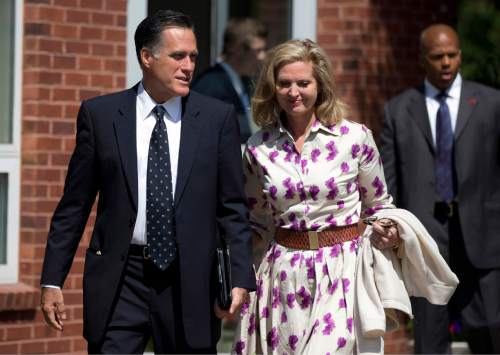 Evan Vucci  |  AP file photo
Republican presidential candidate, former Massachusetts Gov. Mitt Romney and his wife Ann, leave a Church of Jesus Christ of Latter-day Saints meetinghouse after services in 2012.