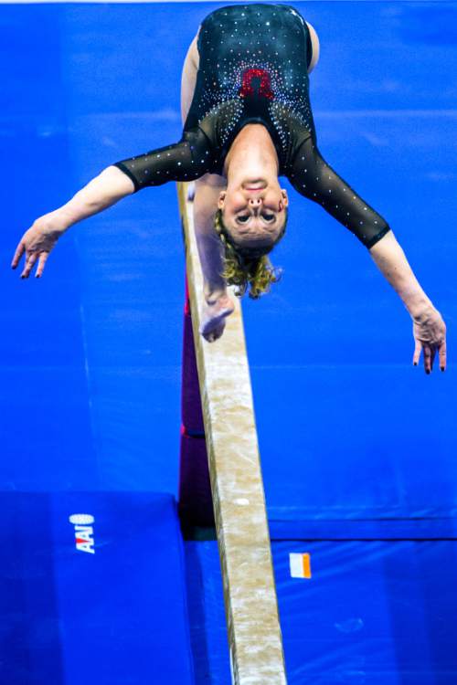 Chris Detrick  |  The Salt Lake Tribune
Utah gymnast Maddy Stover performs on the beam during the Red Rocks Preview at the Huntsman Center Friday December 11, 2015.