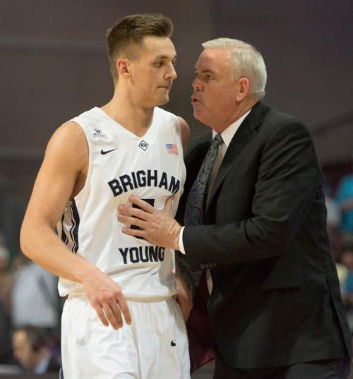 Rick Egan  |  The Salt Lake Tribune

Brigham Young Cougars head coach Dave Rose congratulates Brigham Young Cougars guard Kyle Collinsworth (5), after he tied the NCAA career record with his 6th career triple double, and also set a season record for most triple -doubles in a season, in West Coast Conference Basketball Championship action, BYU vs. Portland, at the Orleans Arena, in Las Vegas, Monday, March 9, 2015