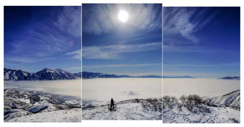 Francisco Kjolseth | The Salt Lake Tribune
Jason Dunn of Draper seeks higher, cleaner air as he rides his bike to a peak overlooking the obscured Utah county as air quality continues to deteriorate with inversion conditions trapping cold air on Friday, Feb. 12, 2016.
