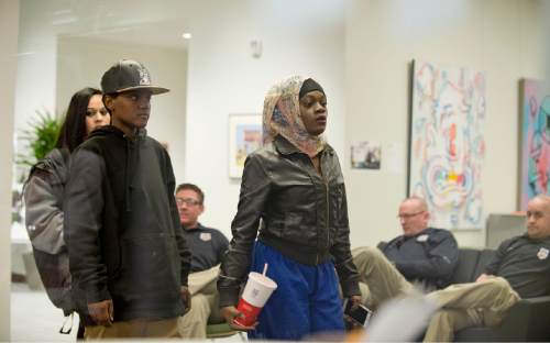 Lennie Mahler  |  The Salt Lake Tribune

Friends and family of Abdi Mohamed enter the auditorium as The Salt Lake City Human Rights Commission and city officials hosted a "listening session"  at the new Marmalade Library regarding the police shooting of the 17-year-old Mohamed.