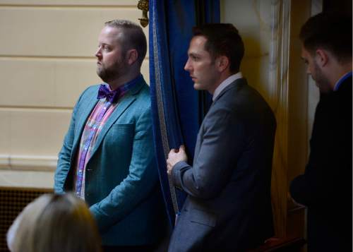 Scott Sommerdorf   |  The Salt Lake Tribune  
Assault victims Taylor Lamont, Rusty Andrade and Maxwell Christen, right, listen to debate on HB107 - Hate Crimes - in the Utah Senate, Wednesday, March 2, 2016.
