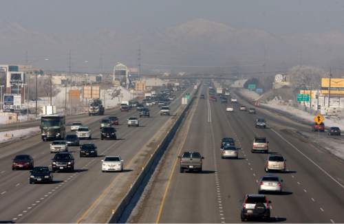 Al Hartmann | Salt Lake Tribune

Traffic on I-15 near Pleasant Grove exit disappears into a polluted haze  looking north towards the Salt Lake Valley at 10:30 a.m. Wednesday January 14, 2009.