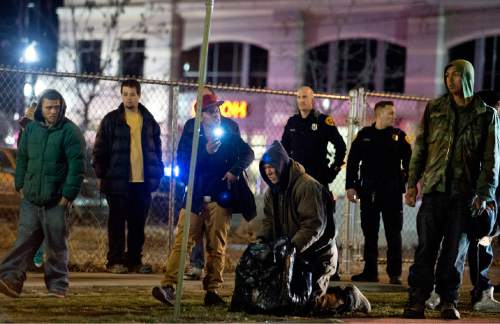 Lennie Mahler  |  The Salt Lake Tribune

Selam Mohammad records with a cell phone the events of Saturday, Feb. 27, 2016, following the police shooting of 17-year-old Abdi Mohamed. Police arrive to disperse a crowd that had formed in downtown Salt Lake City.