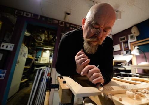 Francisco Kjolseth  |  The Salt Lake Tribune
The details matter as master picture framer Scott Gardner hand carves a frame for a client. Working out of his small one car garage and his basement, Gardner is not interested in making a prima donna statement, but rather to enhance, present and increase the value of a piece of art.