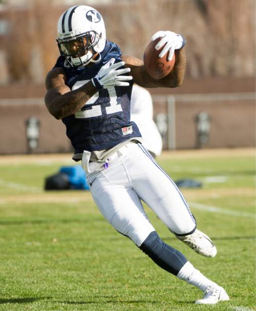 Rick Egan  |  The Salt Lake Tribune

BYU running back Jamaal Williams (21) runs with the ball, during passing drills, on the second day of spring practice, in Provo, Thursday, March 3, 2016.