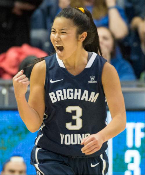 Rick Egan  |  The Salt Lake Tribune

Brigham Young Cougars guard Kylie Maeda (3) celebrates as BYU extends their lead on a 3-point shot by Brigham Young Cougars guard Makenzi Morrison Pulsipher (23), in basketball action, BYU vs. Utah, in the Marriott Center, Saturday, December 12, 2015.