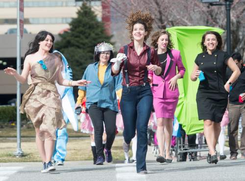 Rick Egan  |  The Salt Lake Tribune

Participants in the 9th Annual Urban Chariot Race, cross 600 South, Saturday, March 5, 2016.