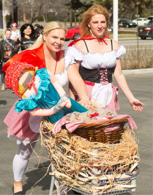 Rick Egan  |  The Salt Lake Tribune

The "Little Red Riding Hood" teams makes their way down 600 South, in the 9th Annual Urban Chariot Race, Saturday, March 5, 2016.