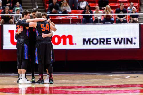 Trent Nelson  |  The Salt Lake Tribune
Timpview players huddle before the game as they face Olympus in the 4A state championship high school basketball game at the Huntsman Center in Salt Lake City, Saturday March 5, 2016.