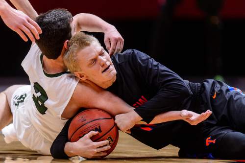 Trent Nelson  |  The Salt Lake Tribune
Olympus's Nate Fox (3) and Timpview's Levi Wilson (11) tie up the ball as Timpview faces Olympus in the 4A state championship high school basketball game at the Huntsman Center in Salt Lake City, Saturday March 5, 2016.