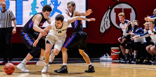 Trent Nelson  |  The Salt Lake Tribune
Olympus's Nate Fox (3) is fouled in the final seconds as Olympus defeats Timpview in the 4A state championship high school basketball game at the Huntsman Center in Salt Lake City, Saturday March 5, 2016.