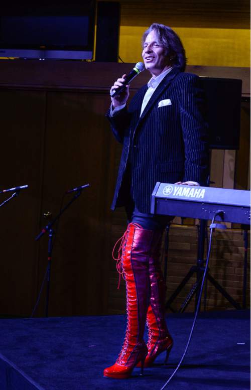 Francisco Kjolseth | The Salt Lake Tribune
Kurt Bestor wears his Kinky Boots as the Broadway at the Eccles announce their 2016-17 season, the first in the to-be-opened Eccles Theatre on Main Street. The presenters had a glittering gala for the announcement held at Abravanel Hall, featuring funders and producers and a choir of Riverton High School kids.
