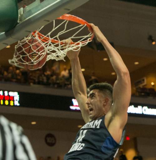 Rick Egan  |  The Salt Lake Tribune

Brigham Young center Corbin Kaufusi (44) dunks the ball for the Cougars, in the West Coast Conference Semifinals, at the Orleans Arena in Las Vegas, Saturday, March 7, 2016.