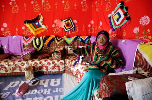 Abdi Mohamed's cousin Muslima Aden talks during a interview Thursday, March 3, 2016, Salt Lake City. Mohamed, a 17-year-old Somali refugee critically wounded in a high-profile police shooting in Utah fled to the U.S. from a refugee camp where food was scare, scorpions scurried everywhere and a toilet was a hole in the ground. Mohamed's family settled in Salt Lake City, hoping for a better life. (AP Photo/Rick Bowmer)