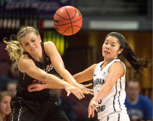 Rick Egan  |  The Salt Lake Tribune

Santa Clara Broncos forward Marie Bertholdt (15) and Brigham Young Cougars guard Kylie Maeda (3) for for a the ball, in basketball action in the West Coast Conference Semifinals, at the Orleans Arena in Las Vegas, Saturday, March 7, 2016.