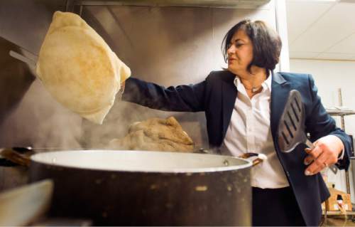 Steve Griffin  |  The Salt Lake Tribune


Nasrin Mohammadi, owner of Pars Market in Salt Lake City, checks on the herbed rice dish called Sabzi polo Friday, March 4, 2016. The dish is the traditional food for Persian New Year, or Norouz, which takes on the Spring Equinox.