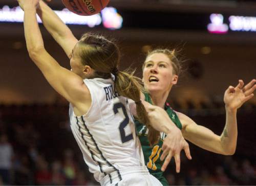 Rick Egan  |  The Salt Lake Tribune

Brigham Young Cougars guard Lexi Eaton Rydalch (21) is fouled by San Francisco Lady Dons guard Rachel Howard (11), in the West Coast Conference Championship game, at the Orleans Arena in Las Vegas, Tuesday, March 8, 2016.